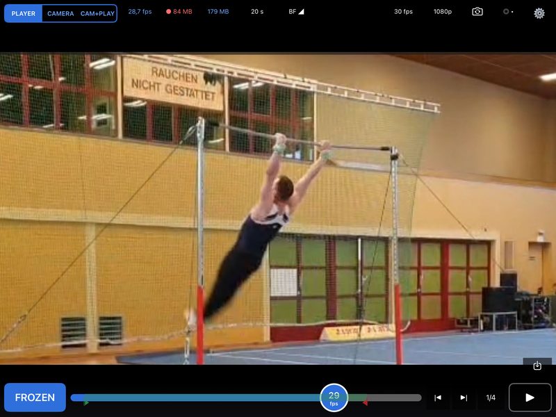 GymPlayer on a tablet: a frozen picture of a gymnast on the high bar, the slider below